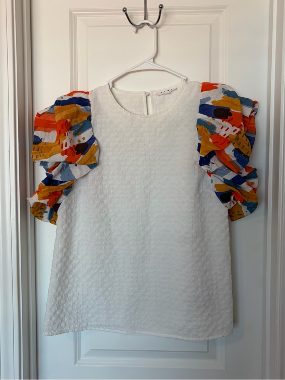 THML
White Textured Top with Colorful Ruffle Sleeves
Size M